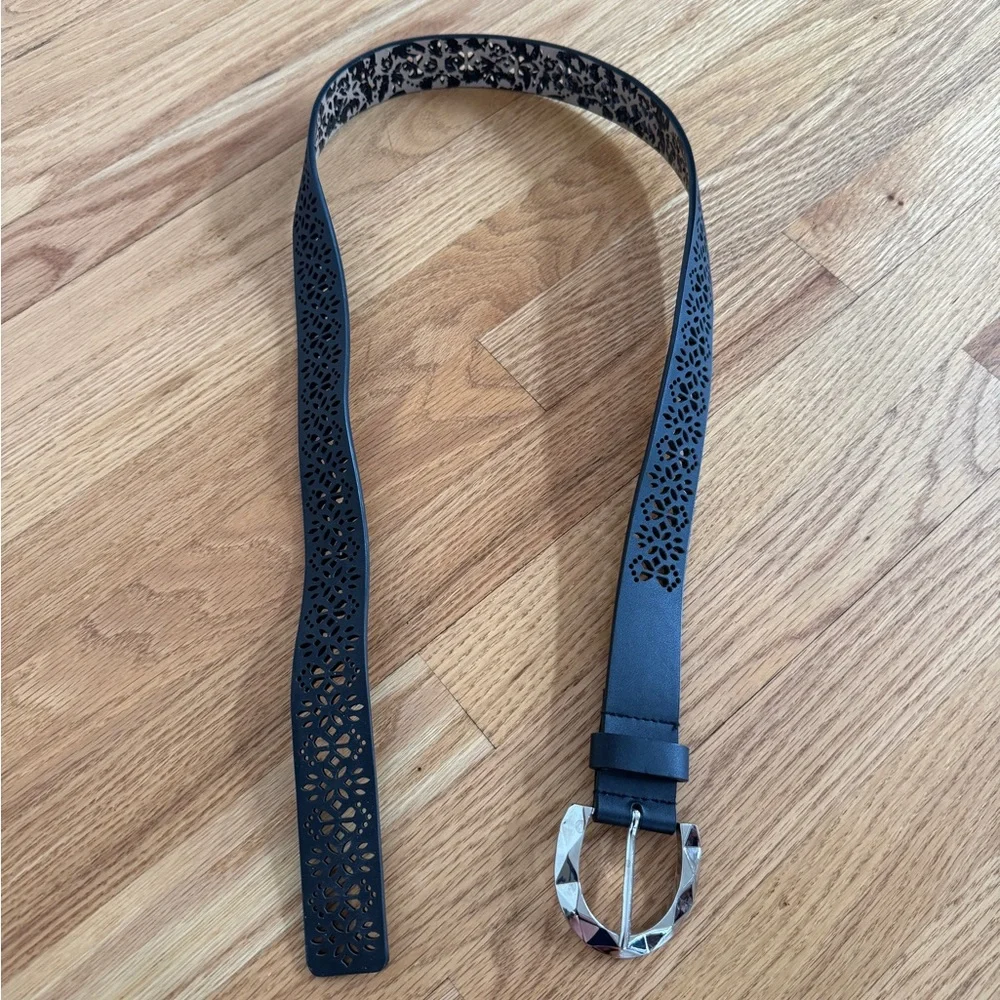 Patterned black belt with silver buckle